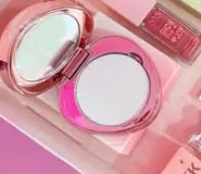 Espejo compacto rosa con esponja